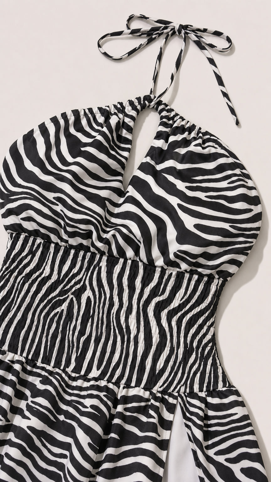 Close up of bodice and halter tie detail of zebra print dress