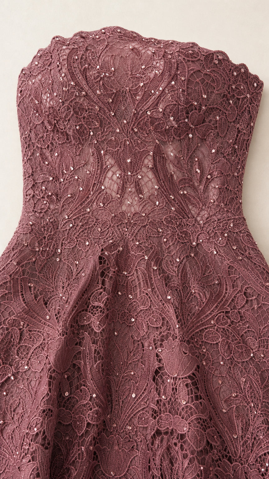Close-up of beaded lace bodice detail on mauve dress