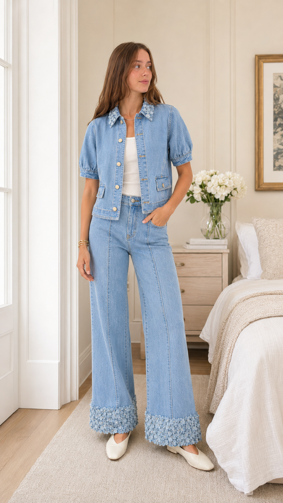 Model wearing light wash blue denim two-piece set with puff sleeve jacket
