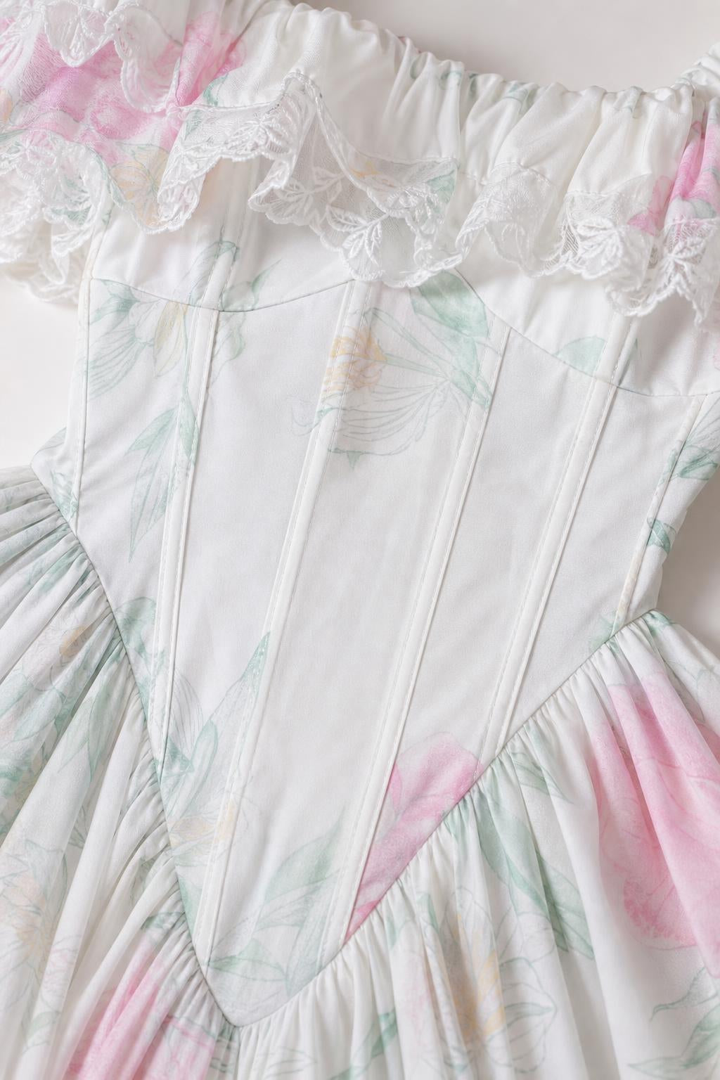 Close-up of structured bodice and ruffled neckline