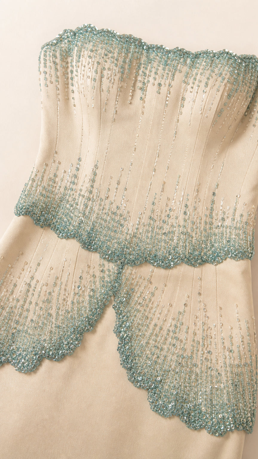 Close-up detail of beaded bodice on evening gown