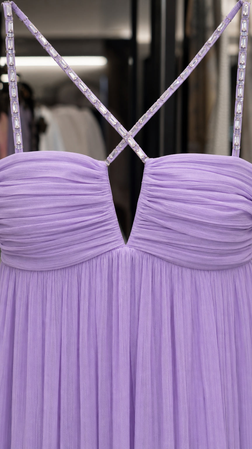 Close-up of rhinestone straps and ruched sweetheart neckline in lavender