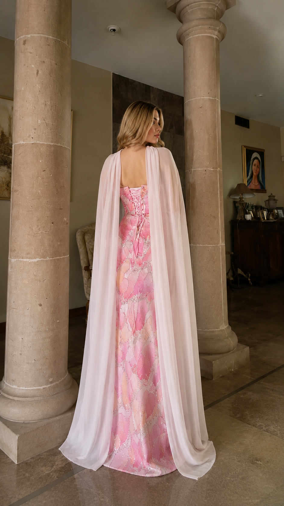 Blush pink floor-length gown back view with long chiffon cape