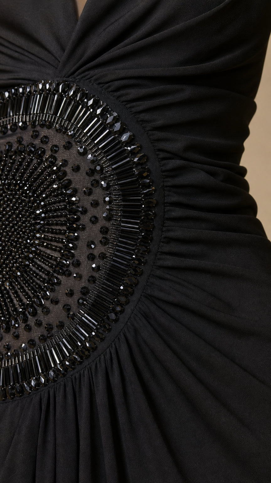 Close-up of intricate beaded waist medallion detail