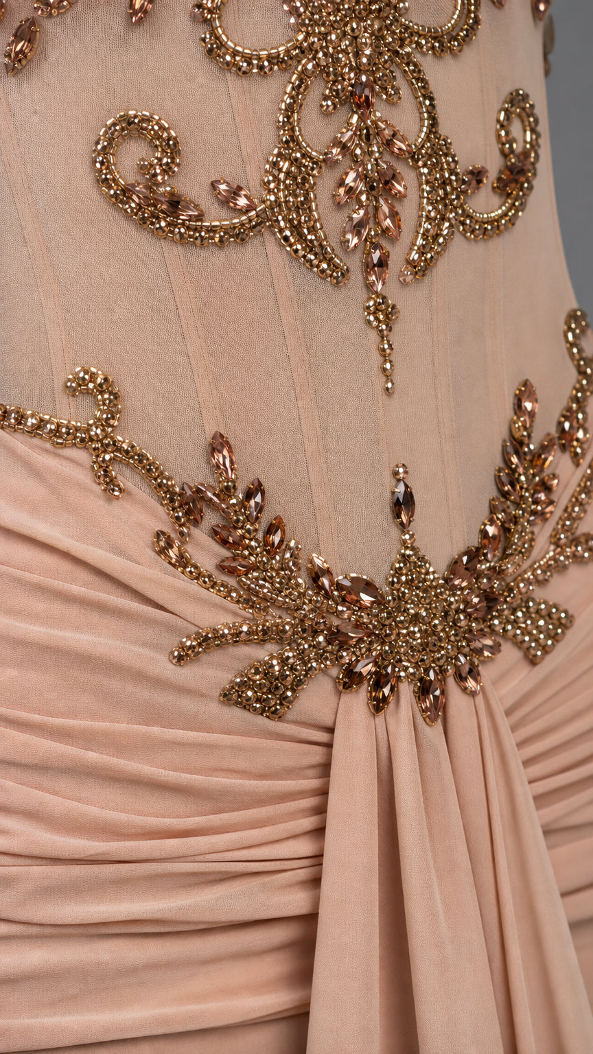 Close-up detail of gold beading on corset bodice
