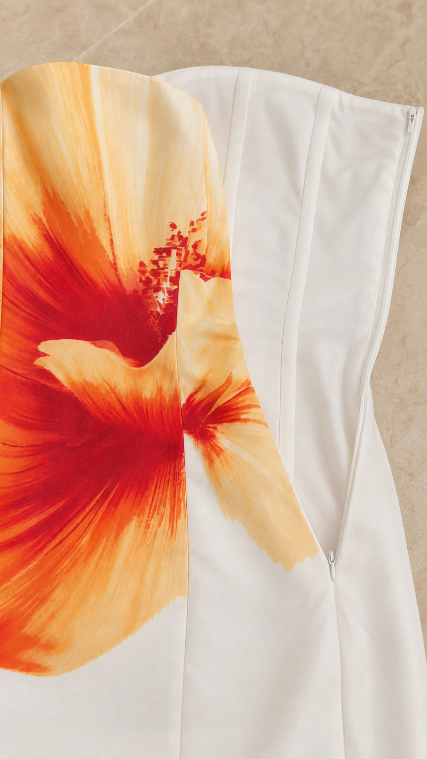 Close up detail of floral print and side zipper