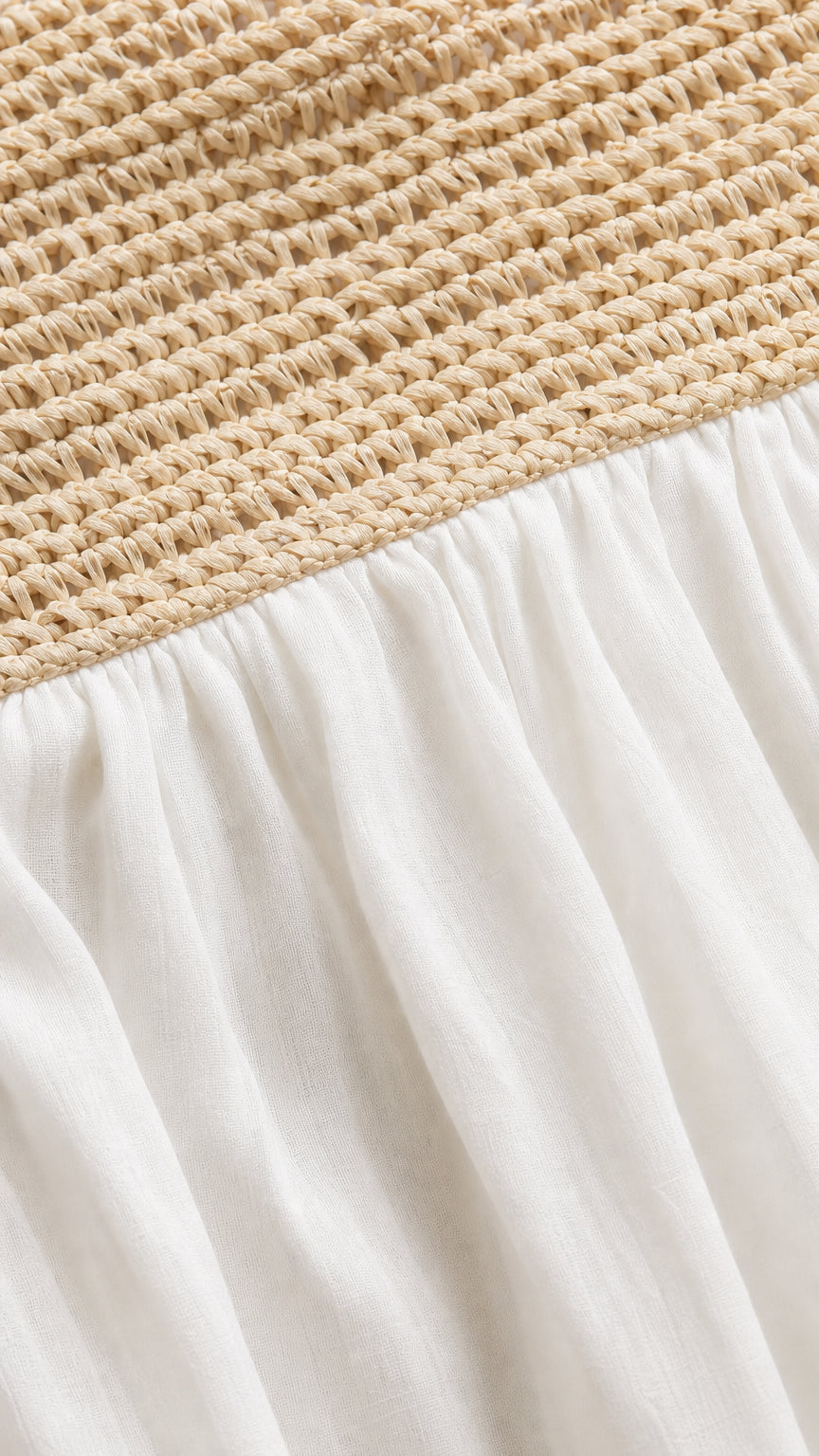 Close up detail of textured smocked bodice and fabric of maxi dress