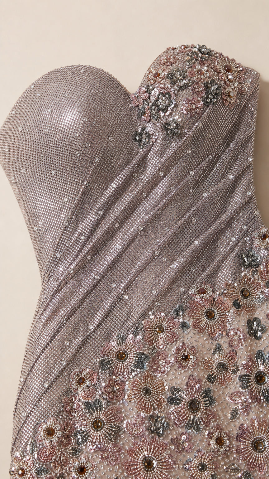 Close-up of floral embellishment and shimmering fabric texture