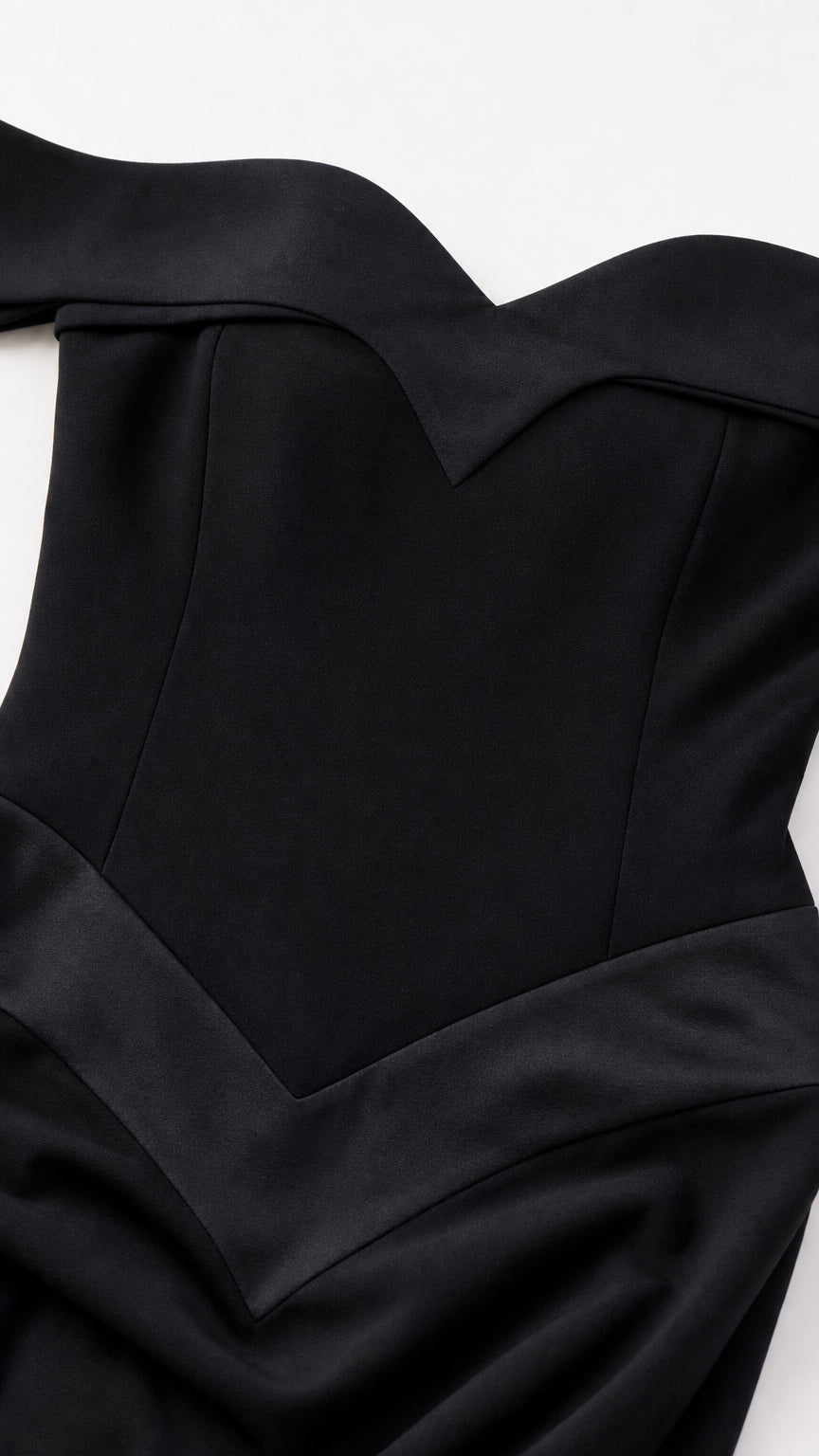 Close-up detail of black off-the-shoulder sweetheart neckline and bodice