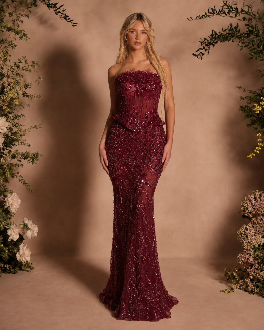 Burgundy strapless sequin mermaid formal gown with fitted silhouette