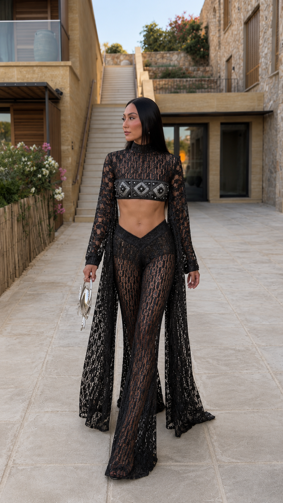 Front view of black sheer lace 3-piece set with crop top, flared pants, and duster