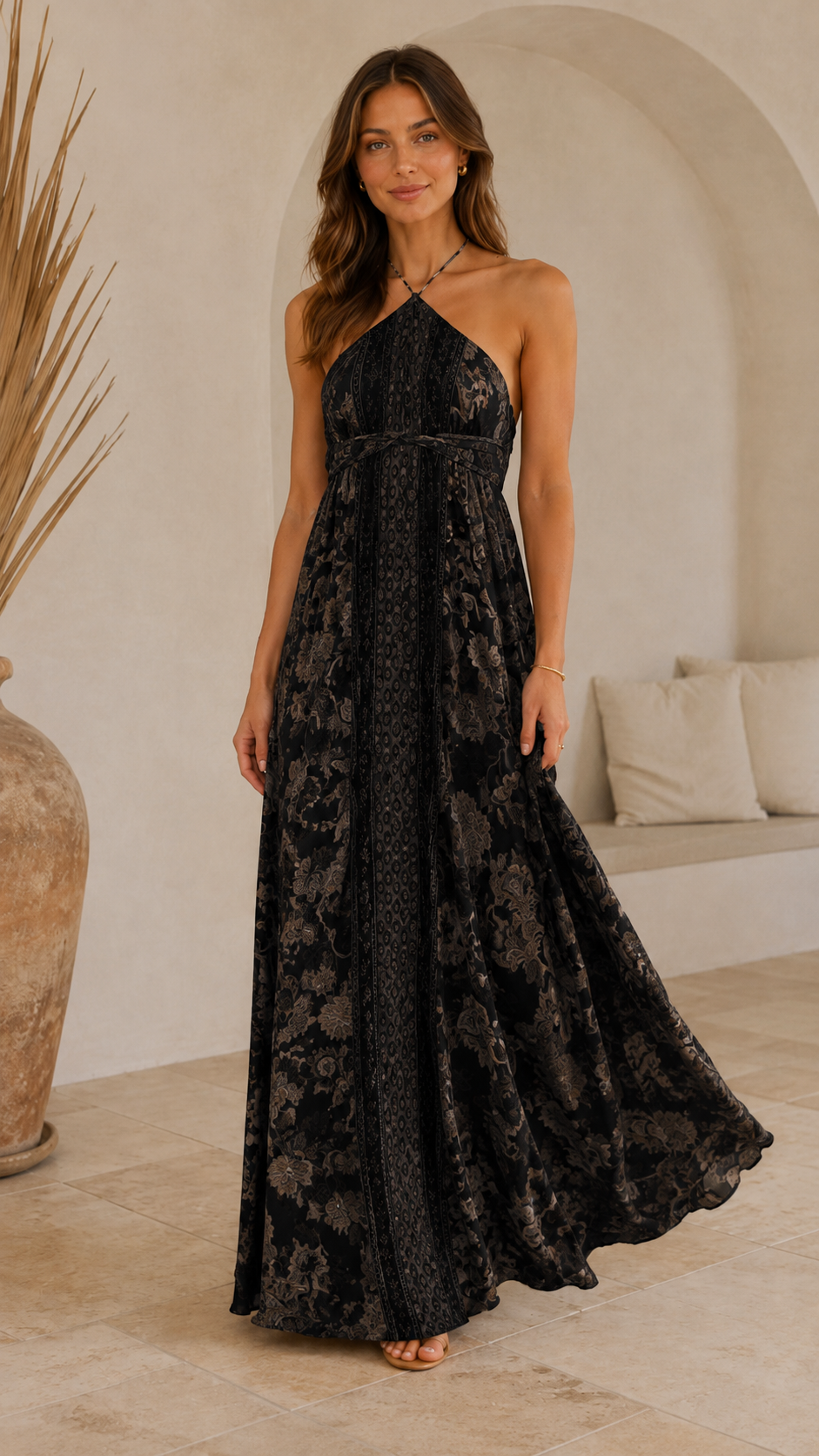 Front view of black boho halter maxi dress with tonal print