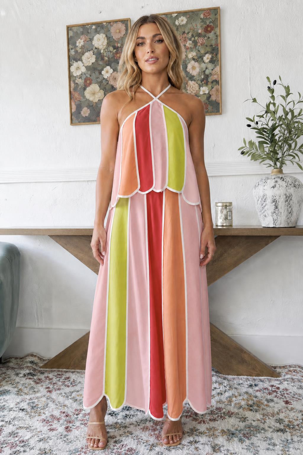 Model wearing pastel tone striped variant maxi dress