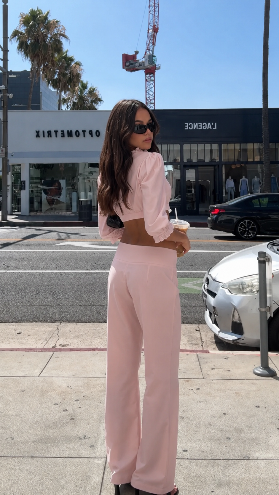 Back view of blush pink cropped top and wide leg pants set