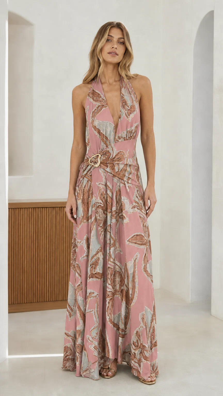 Front view of pink abstract print halter maxi dress