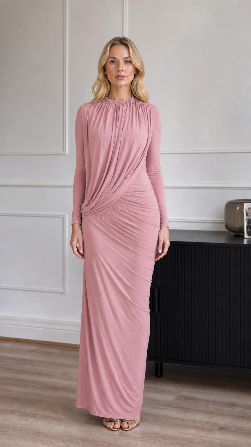 Model wearing dusty rose ruched long-sleeve maxi dress