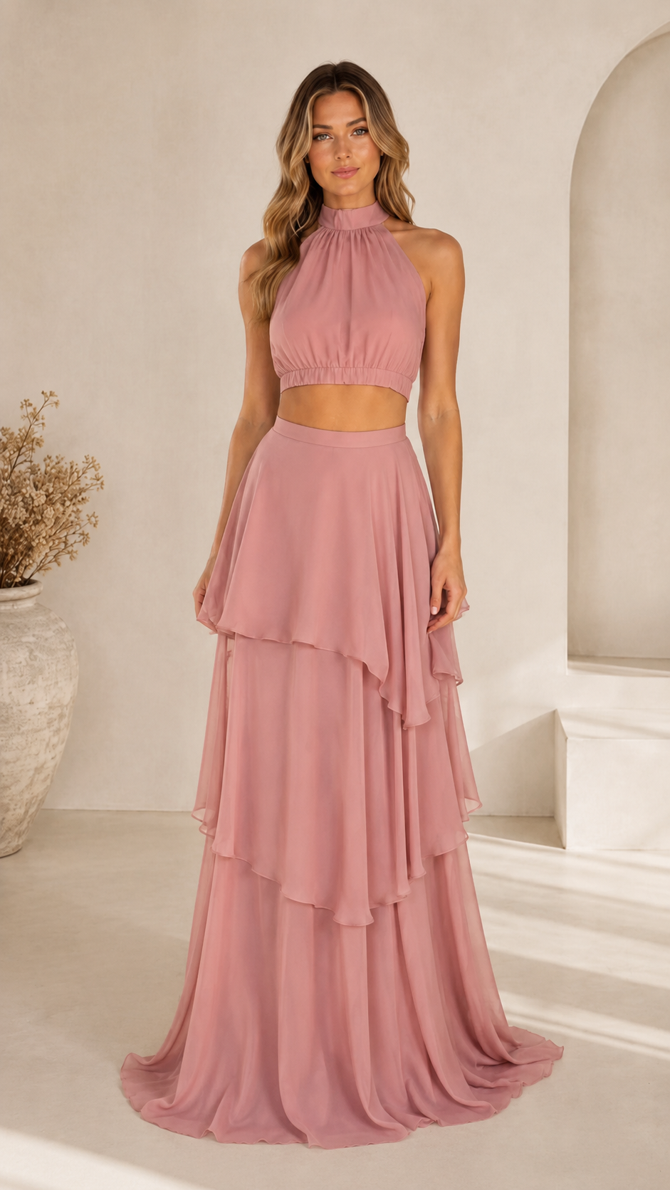 Front view of dusty rose halter crop top and layered maxi skirt set