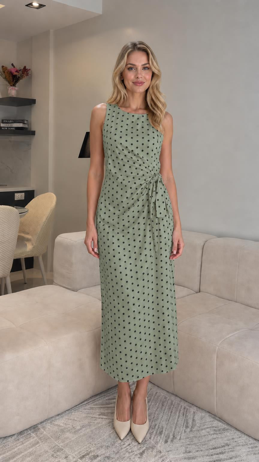 Front view of sage polka dot midi dress