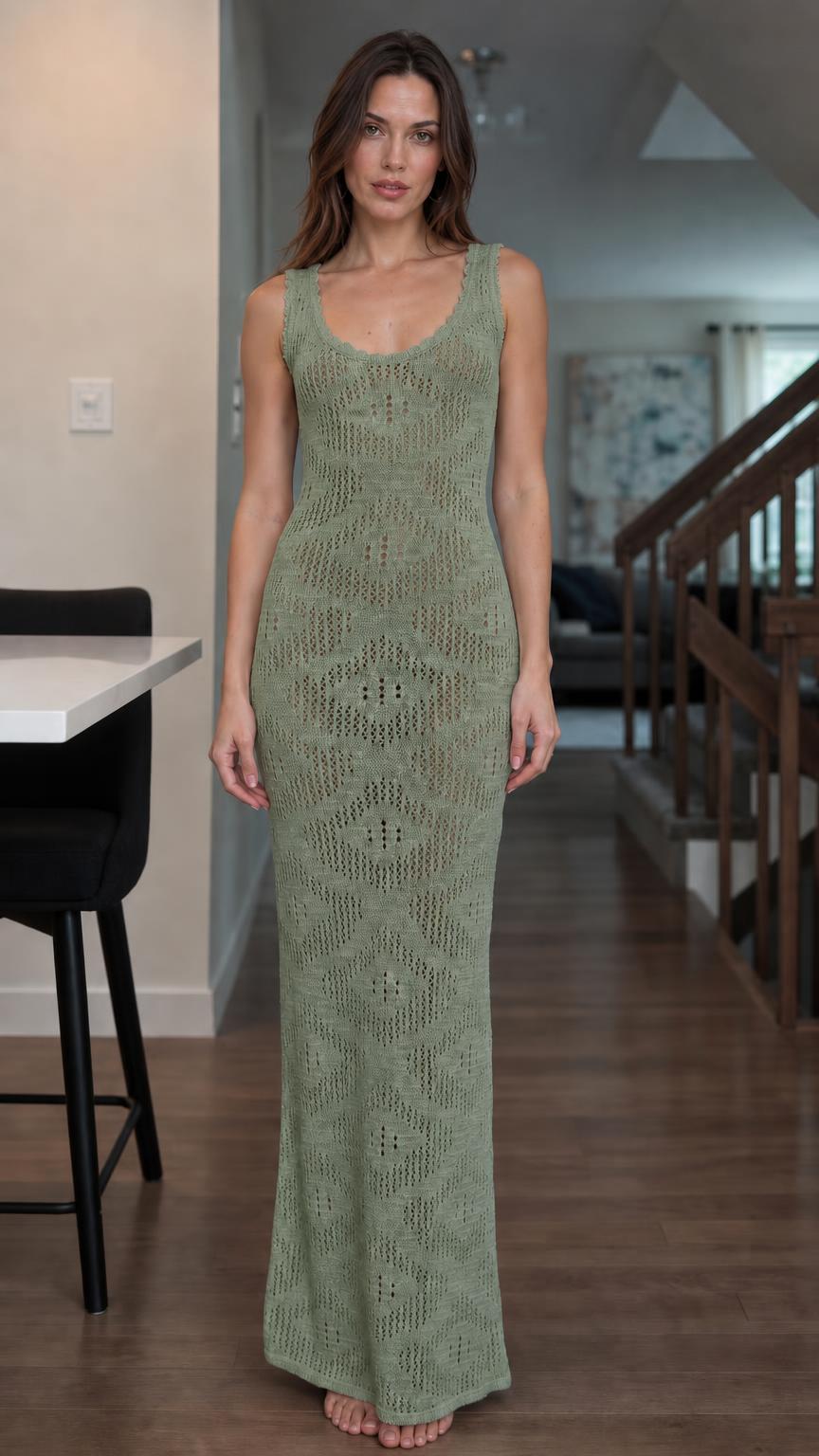 Front view of woman wearing sage green open knit maxi dress