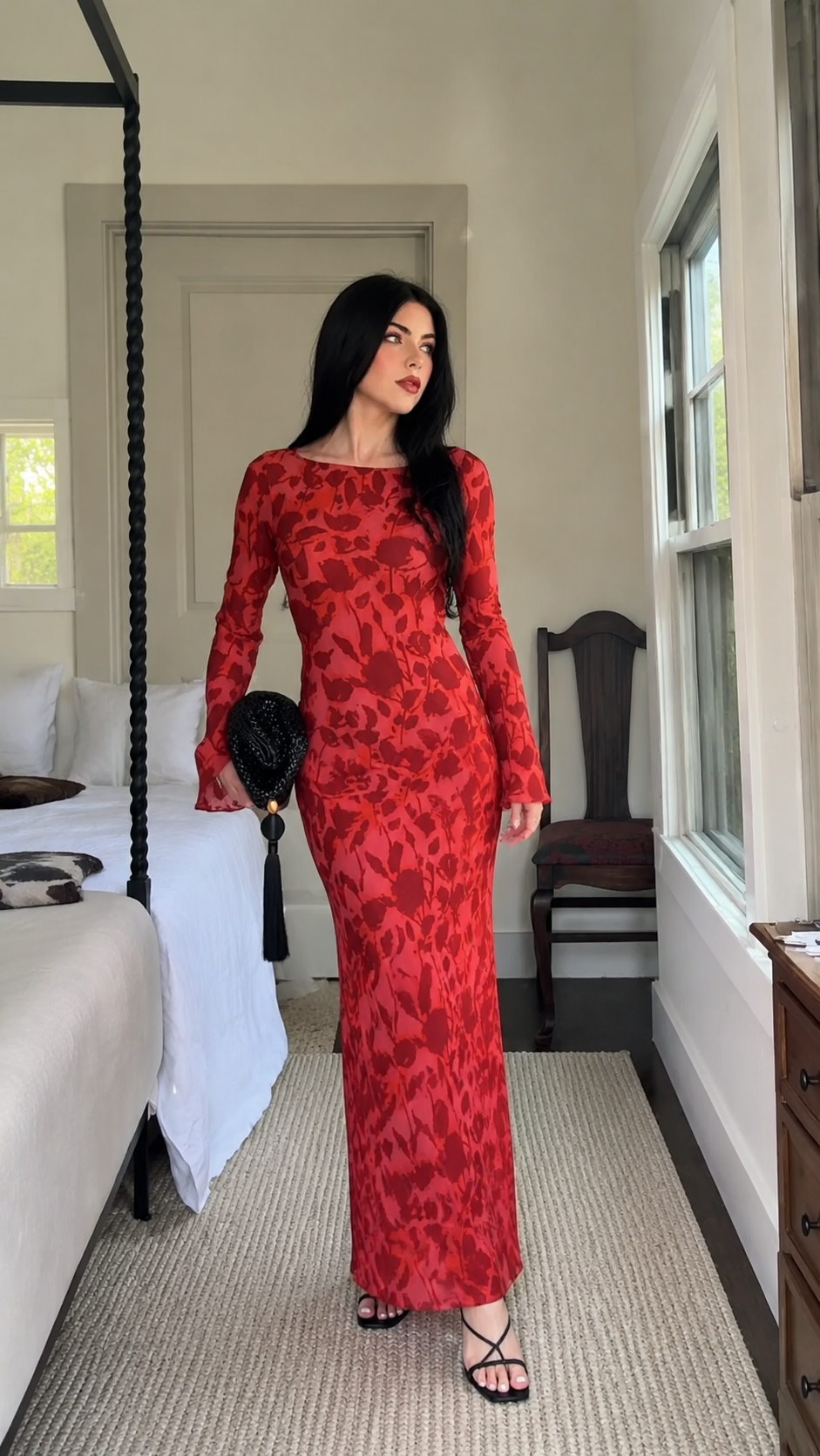 Indoor styling view of red floral long sleeve maxi dress