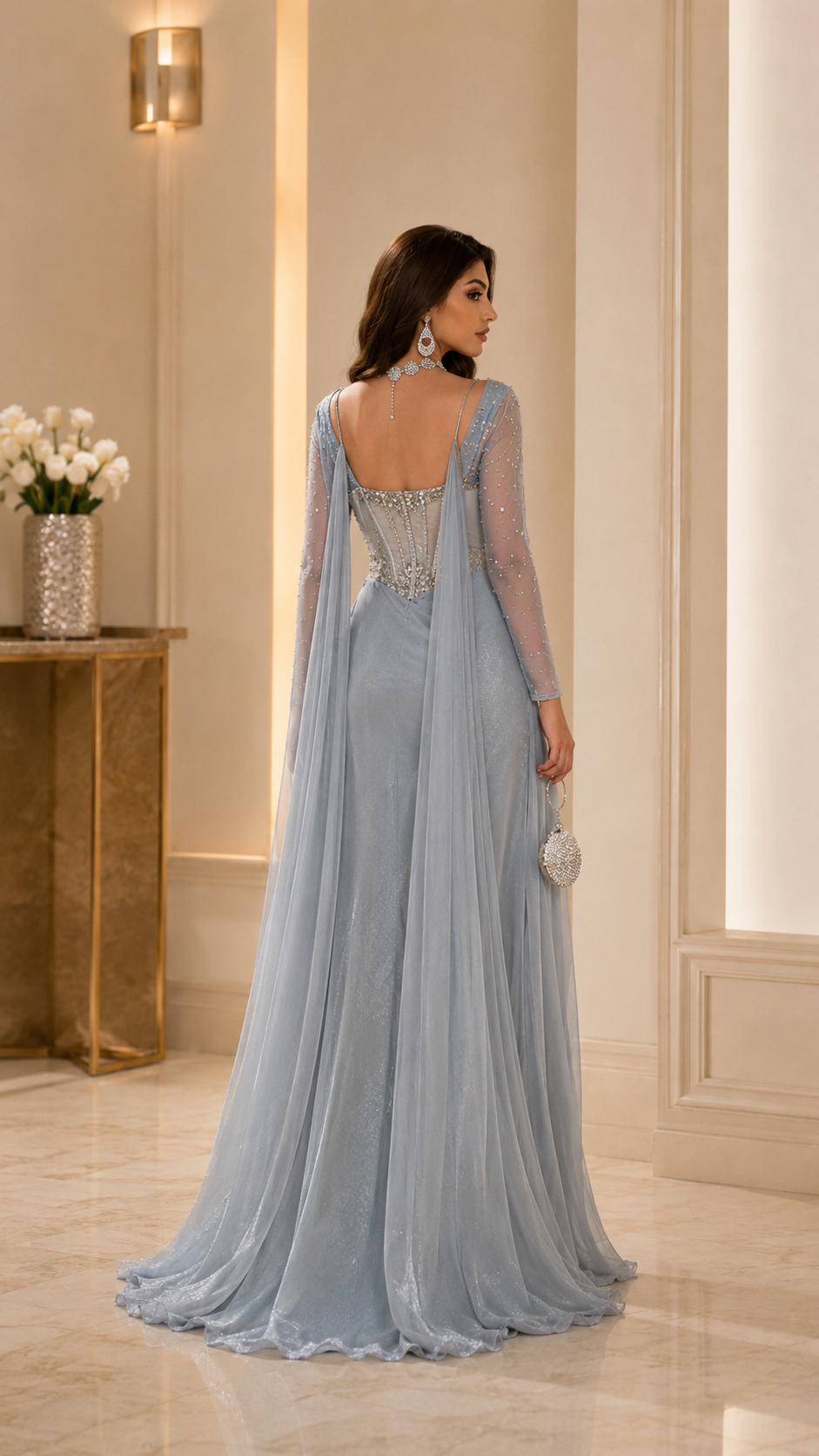 Powder blue embellished evening gown back view with soft scoop back and floor-length skirt