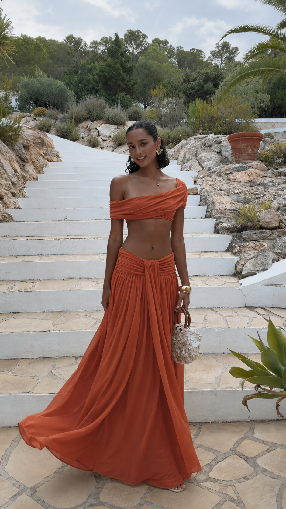 Terracotta off-shoulder crop top and maxi skirt set with sweeping hem