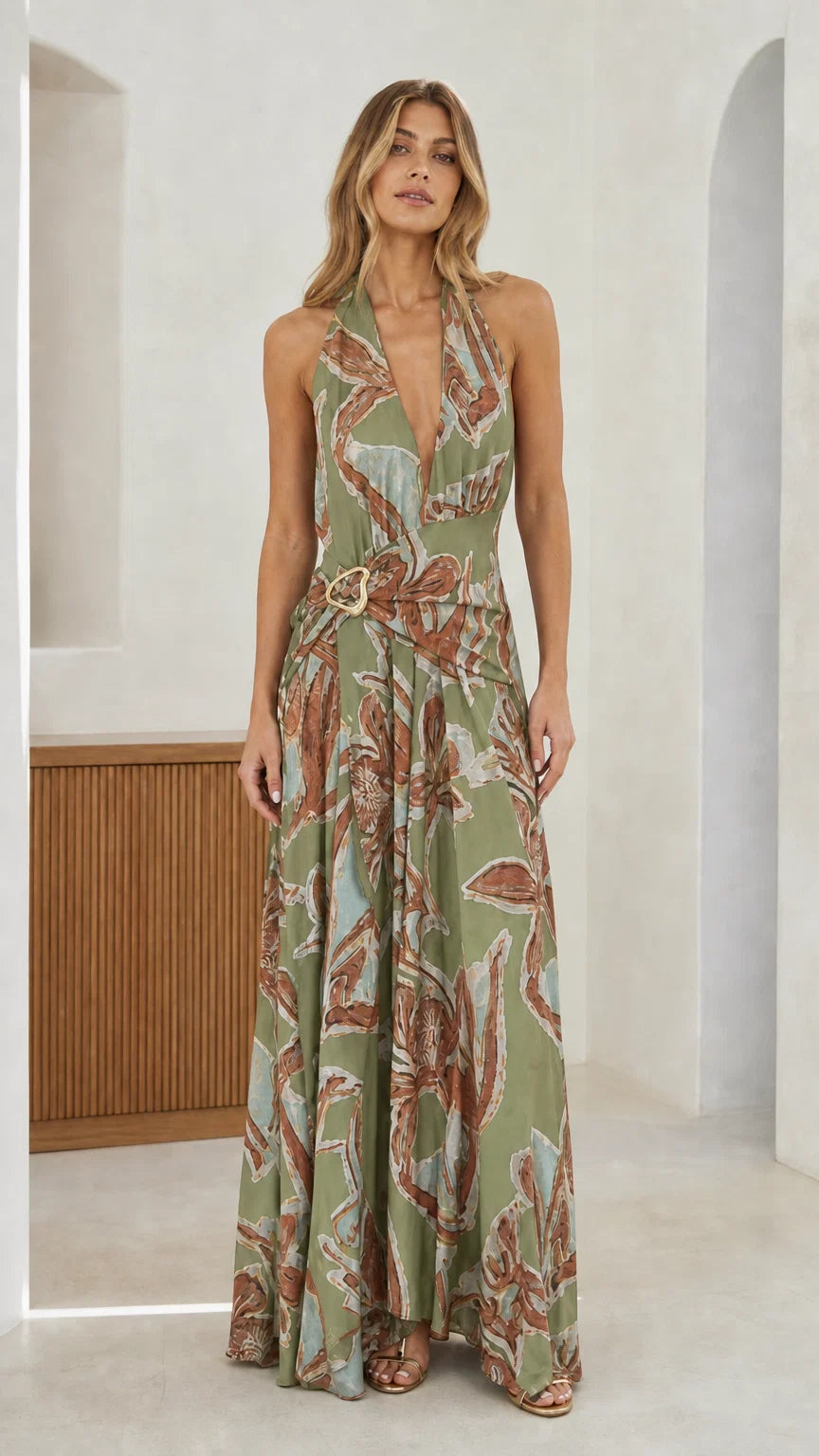 Front view of sage green abstract print halter maxi dress