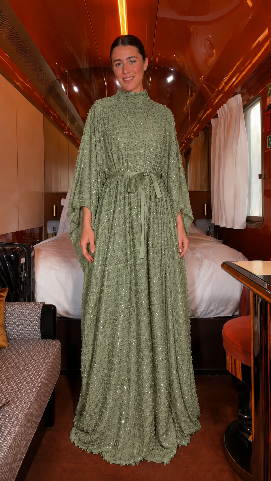 Front view of sage green flowing textured belted maxi caftan dress