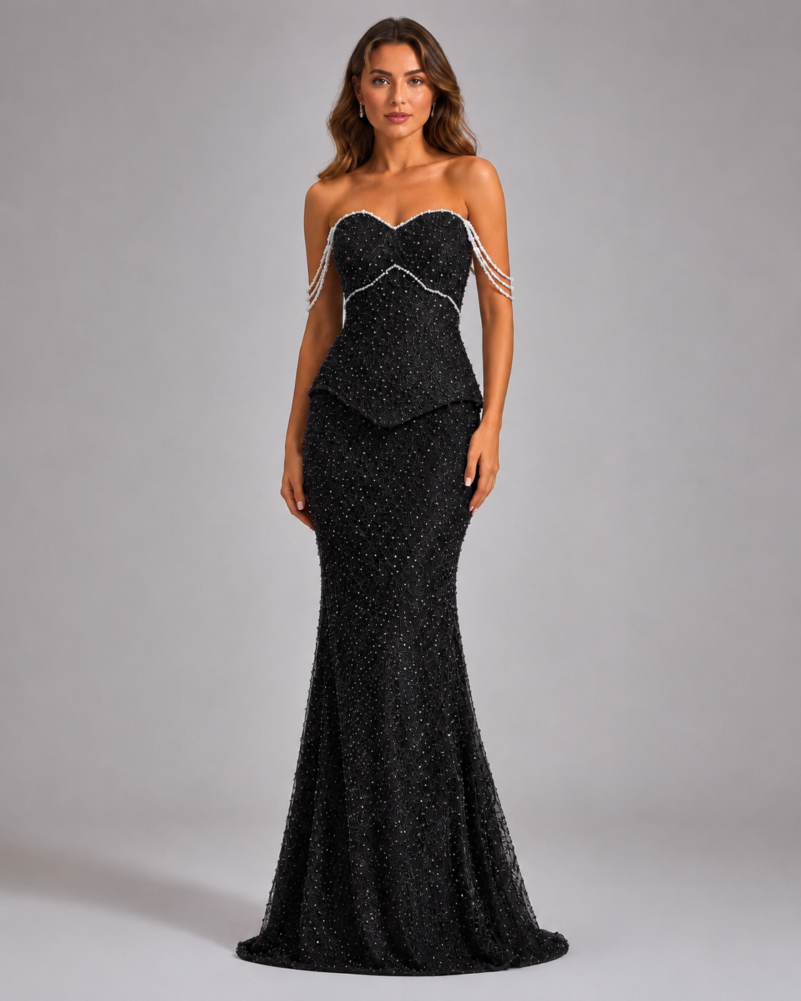 Front view of black sparkling strapless mermaid evening gown