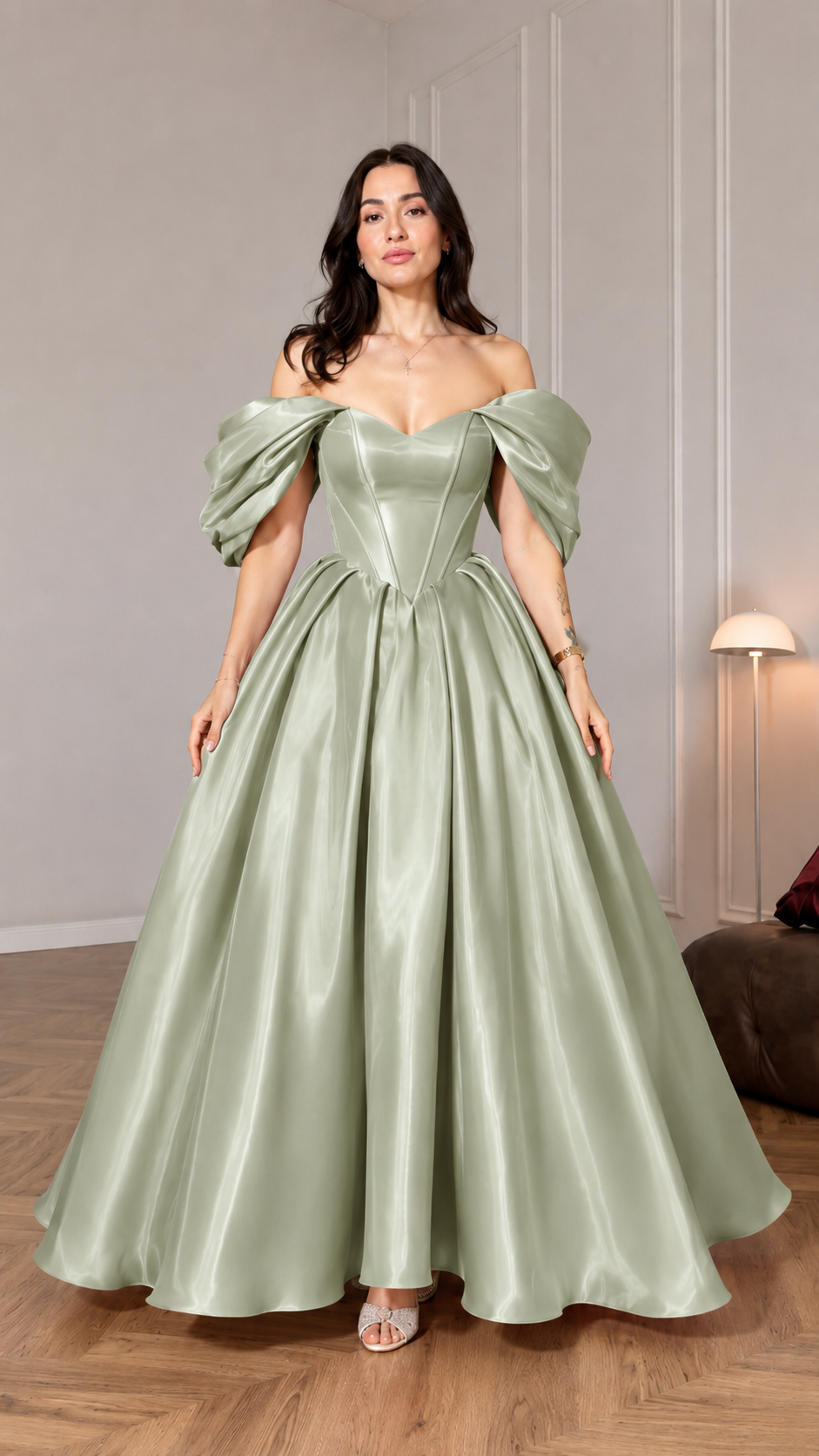 Front view of sage off shoulder maxi ball gown with fitted bodice and voluminous skirt