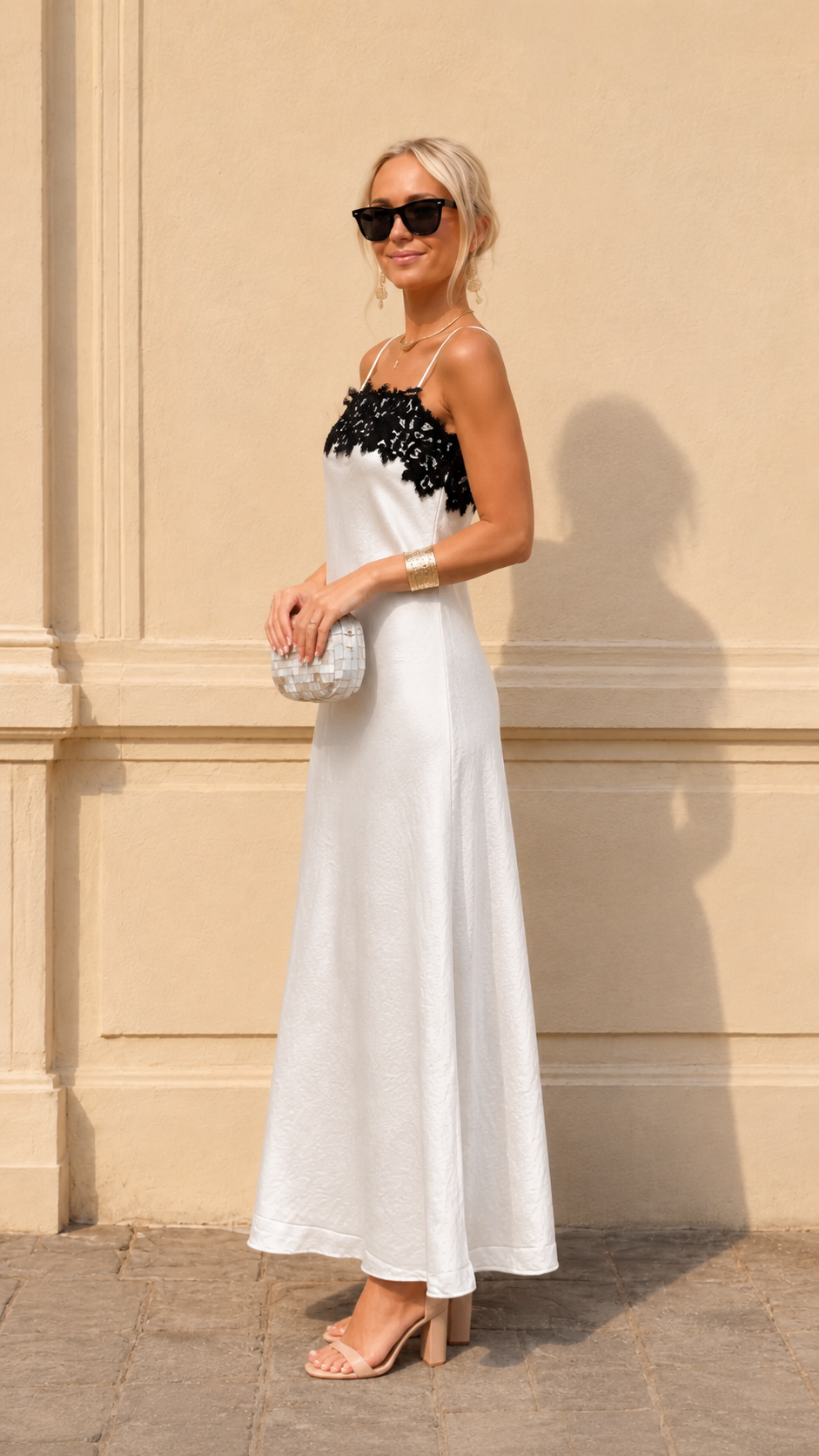 Side view of white satin-look lace trim maxi slip dress