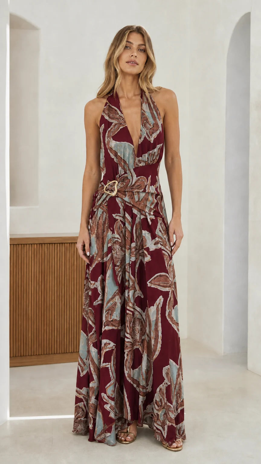 Front view of burgundy abstract print halter maxi dress