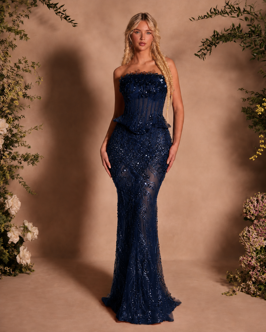 Navy strapless sequin mermaid gown with structured bodice and floor-length hem