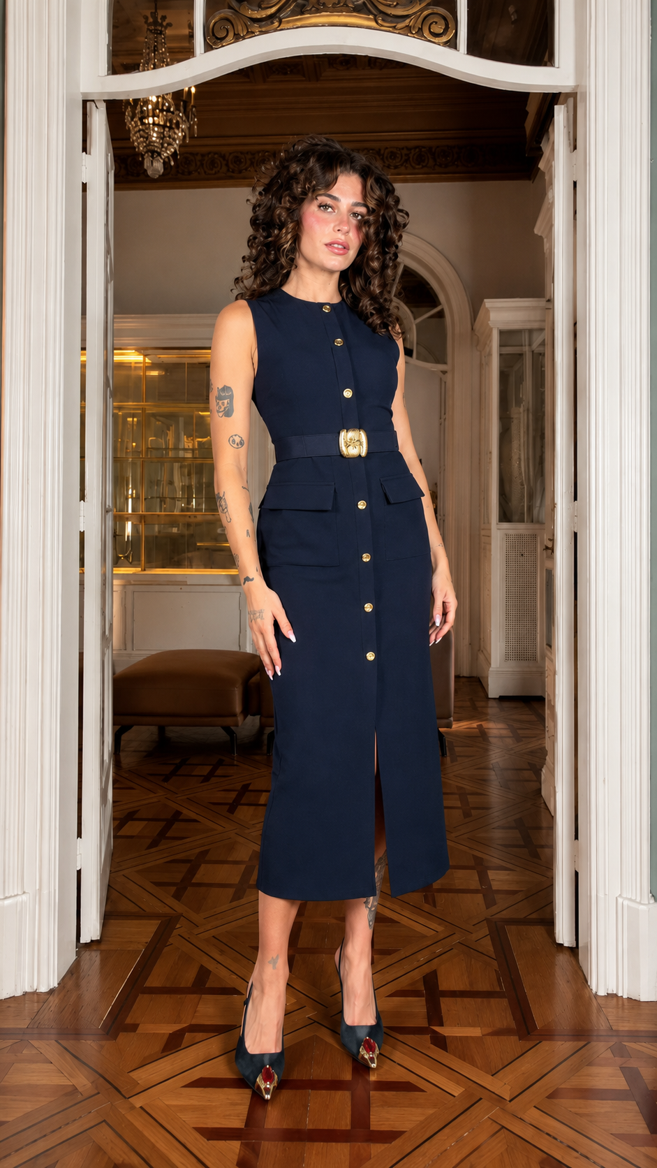 Front view of navy sleeveless belted button-front midi dress