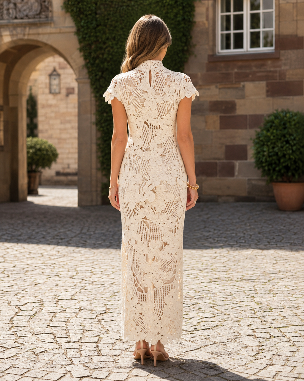 Back view of ivory floral crochet lace mock neck maxi dress