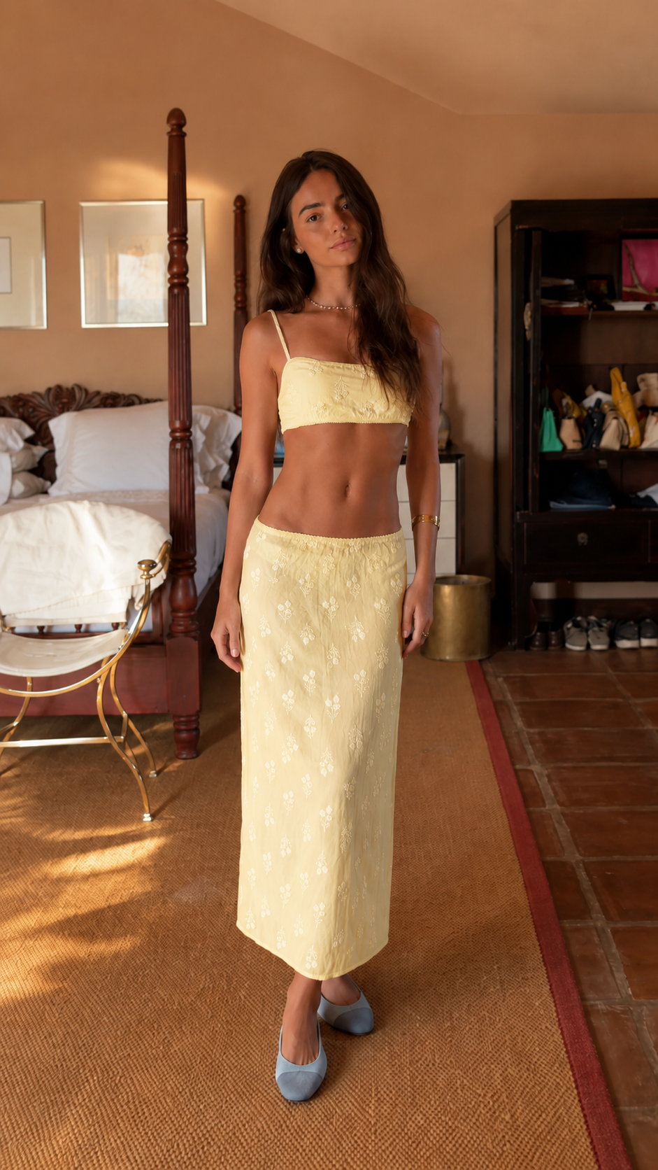 Front view of butter yellow embroidered crop top and maxi skirt set