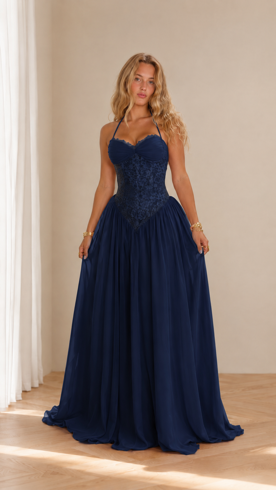 Front view of navy blue lace corset halter evening gown