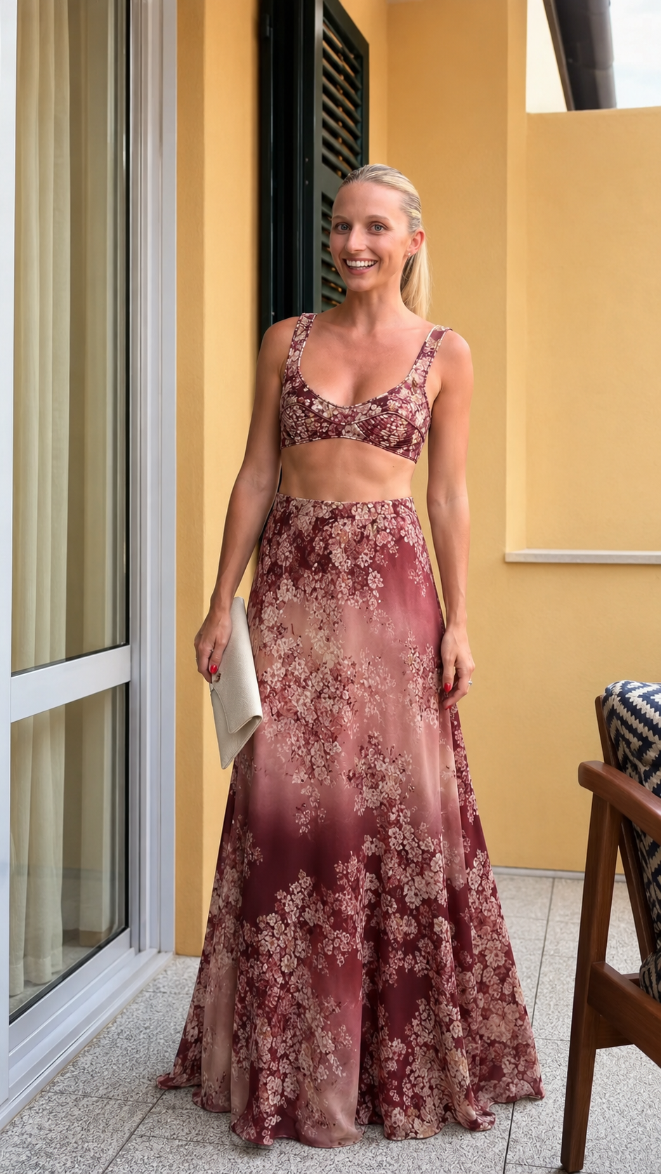Front view of burgundy floral two-piece maxi skirt set